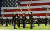 U.S. Army Drill Team tosses their weapons across to each other during a demonstration of their skills and prowess during the U.S. Army All American Bowl 10th Anniversary Celebration and concert at the Alamodome in San Antonio on January 7. Sgt. Eric Glassey,